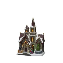 Hus med roterende juletre og musikk LED