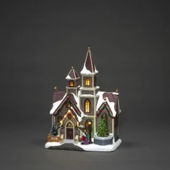 Hus med roterende juletre og musikk LED