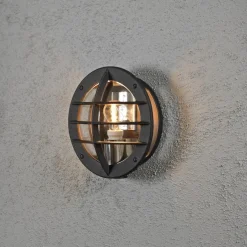 Oden vegglampe utendørs IP23 m/stikkontakt - Svart/klart glass