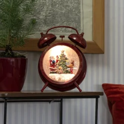 Vannfylt vekkerklokke med nisse, barn og juletre
