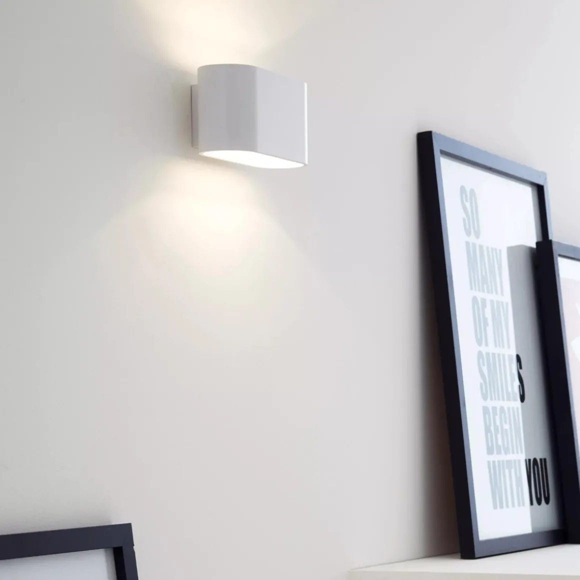 Xera oval vegglampe opp/ned lys